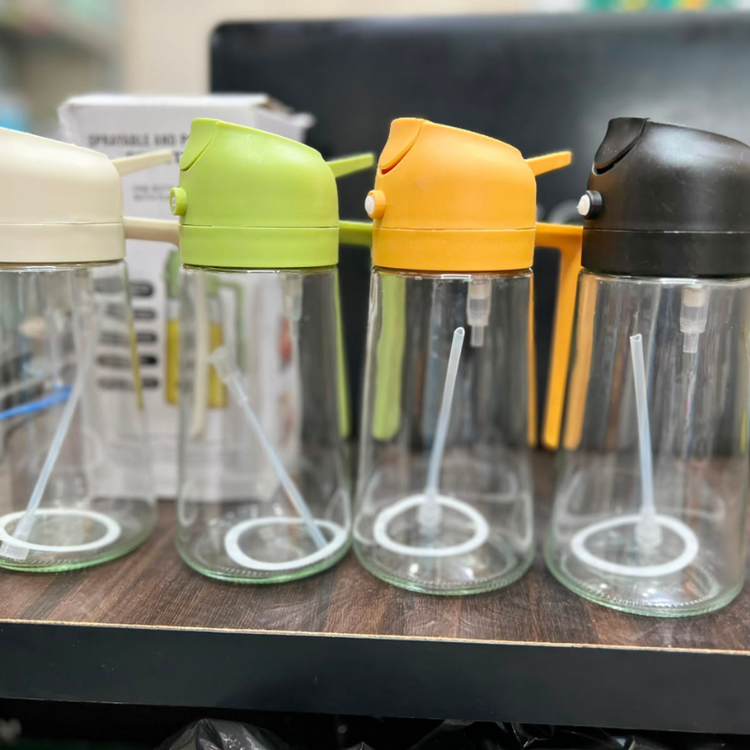 Refillable kitchen oil spray bottles in multiple colors